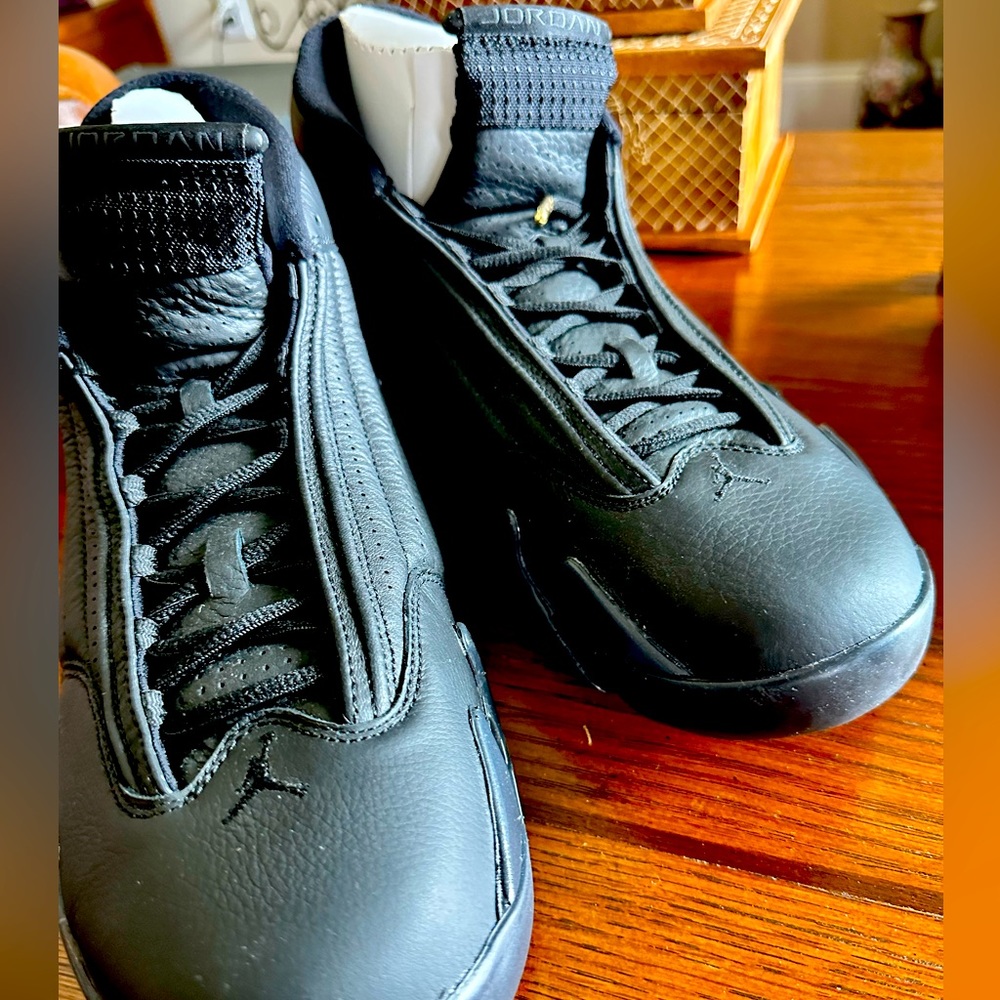 Black and gold Jordans